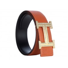 Hermès Togo bőr öv, arany H csattal, narancssárga gyémánttal és díszítéssel.